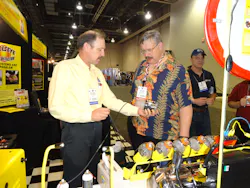Bernie Thompson, left, of Automotive Test Solutions shows the Bullseye leak detector system, which can detect small leaks, at the 2013 AAPEX show. Bernie Thompson, left, of Automotive Test Solutions shows the Bullseye leak detector system, which can detect small leaks, at the 2013 AAPEX show.
