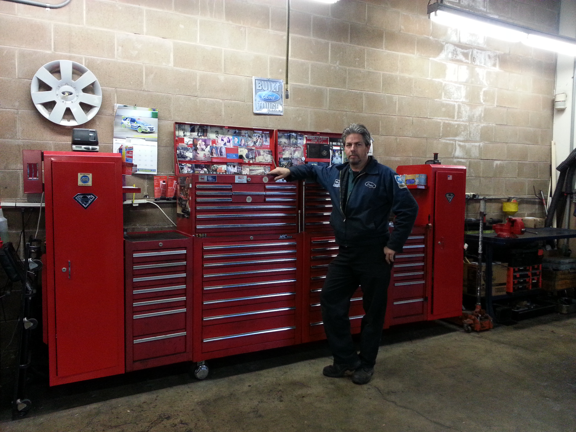 David Lewis stands with his combo Mac Tools and Snap-on toolbox.