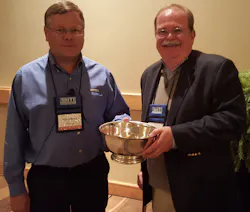 Rick Clemence (left), newly elected president of the Hand Tools Institute presents Earl Cunningham (right), the HTI Presidents Bowl in appreciation of his leadership and service to HTI. Rick Clemence (left), newly elected president of the Hand Tools Institute presents Earl Cunningham (right), the HTI Presidents Bowl in appreciation of his leadership and service to HTI.
