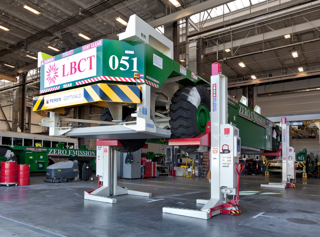 An Automated Guided Vehicle on Stertil-Koni ST 1130 Mobile Column Lifts, with a capacity of 116,000 lbs. for a set of four.