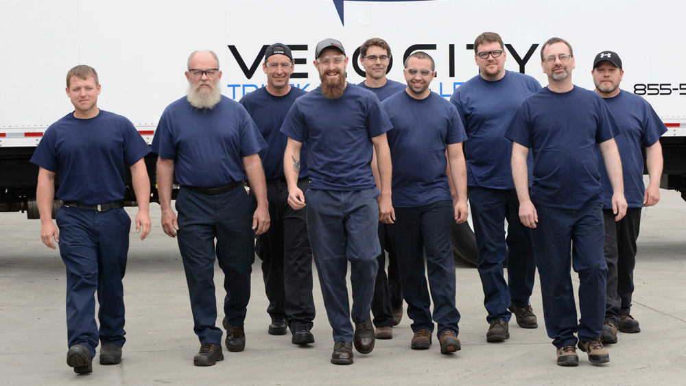 Nine qualifying technicians earned their spots in the 7th annual NationaLease Tech Challenge. Richard Davis (third from right) of Hogan Truck Leasing, Inc., a NationaLease member, was named Top Tech.