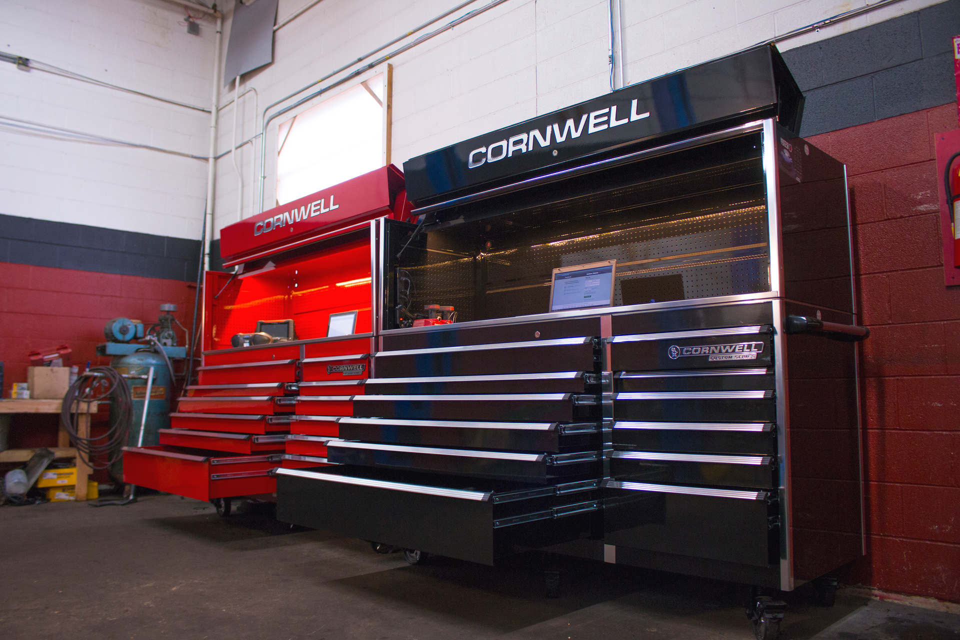 Two almost identical Cornwell tool boxes, even down to the tools inside, take up 14 feet of wall space at On the Shop Auto in Alsip, Illinois.