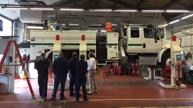 Image 1 Individuals Around Truck 5b437222ce067