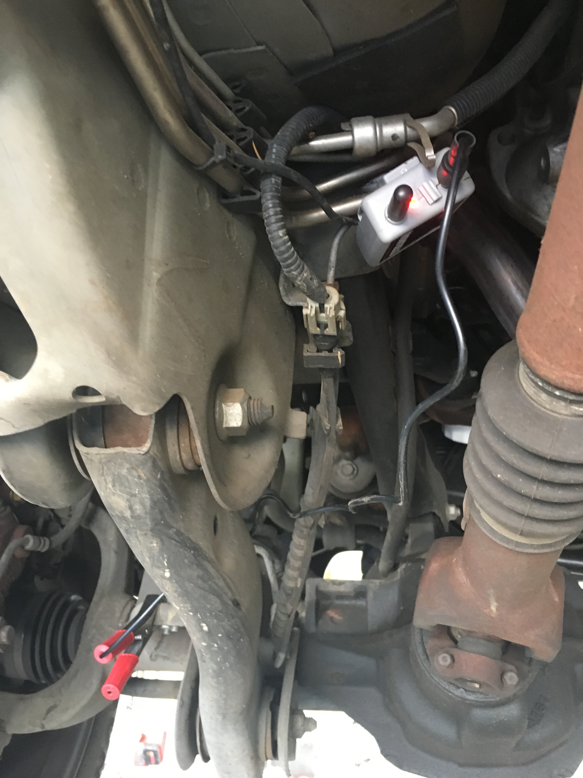 Be sure to place the transmitter and microphone wire in a location away from moving parts and hot exhaust components.