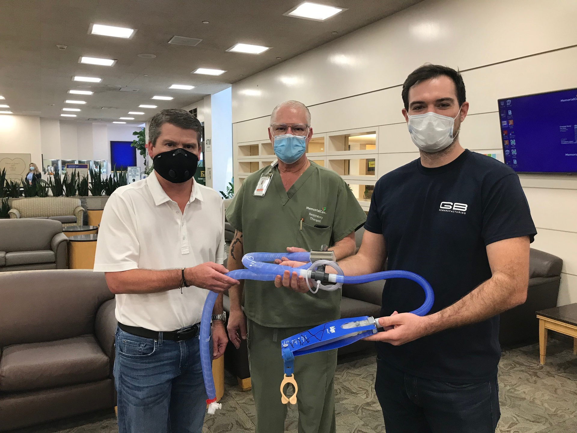 GB Remanufacturing, Inc. delivers ventilator parts to Long Beach Memorial Hospital. From left to right: Mike Kitching, president and CEO, GB Remanufacturing Inc.; James Pierce, respiratory therapy manager, Long Beach Memorial Hospital; Zack Evert, engineering manager, GB Remanufacturing Inc.