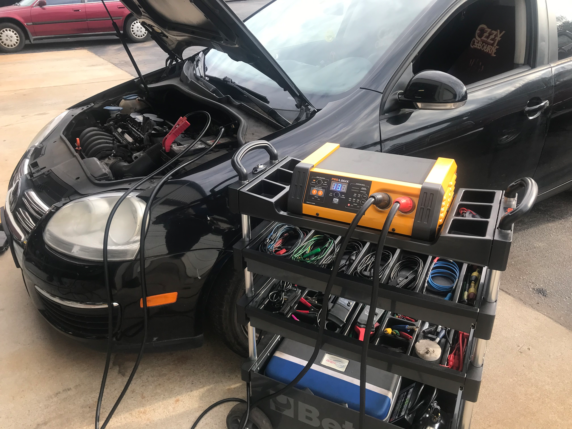 The Clore Automotive SOLAR Pro-Logix 12V 100A Flashing Power Supply and 60/40/10A Battery Charger, No. PL6100, is designed to provide stable power on demand, up to 100A, to a vehicle electrical system to support module reprogramming.
