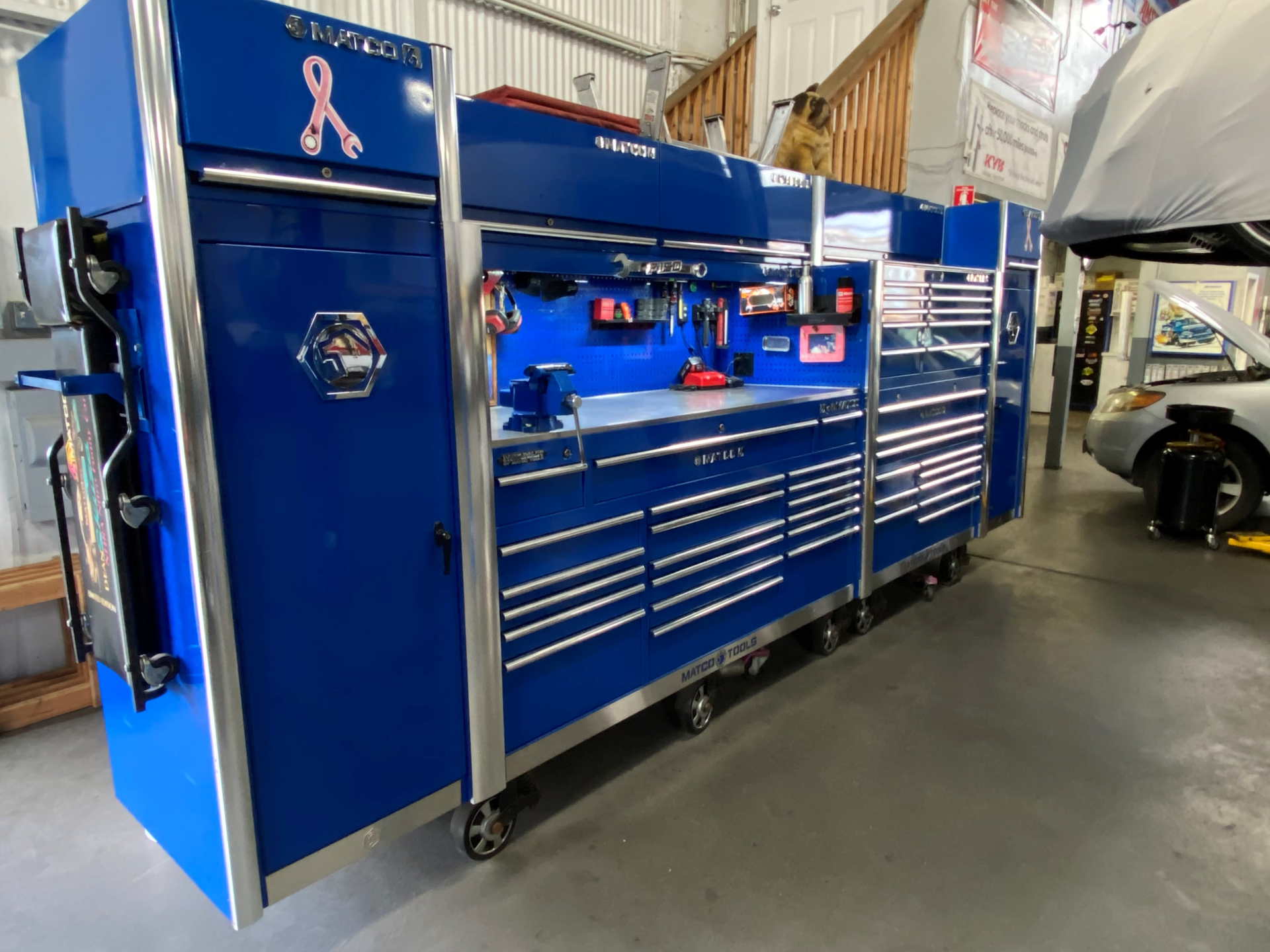 The 17&rdquo; long by 7&rdquo; tall structure consists of three toolboxes, a hutch, two side lockers, and three top lockers, as well as two custom-made boxes to fill the dead space above his side lockers.