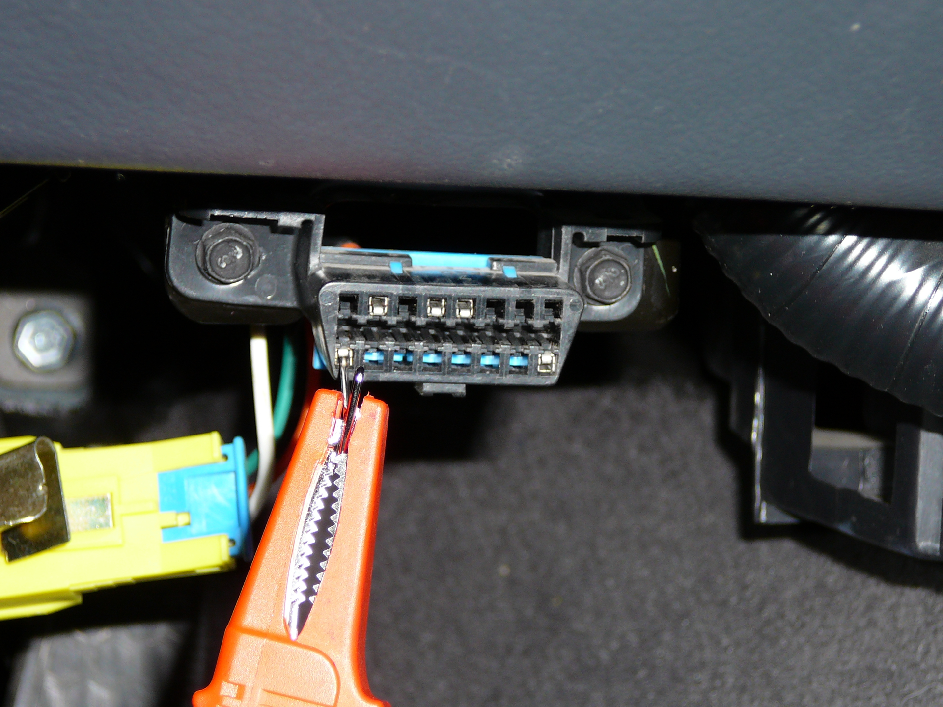 Probing female terminals with ANY tool that does not have the EXACT dimensions of the proper corresponding male terminal (i.e., your scan tool cable end&rsquo;s pins) is a sure way to create new problems your customer did not have prior to you working on their vehicle. Back probing the terminals at the DLC could also present problems unless you removed the DLC bracket and back probed with care. Back probing blind can lead to terminal damage too.
