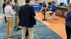 Seated at the table, Sunil Patel (left), with Tekmetric, and Parker Swift (right), with Mechanic Advisor, discuss business solutions at the Supplier and Training Expo (STX) with Bob Cushing, executive vice president of Advance Professional and president of Worldpac, with media and marketing representatives in attendance. Seated at the table, Sunil Patel (left), with Tekmetric, and Parker Swift (right), with Mechanic Advisor, discuss business solutions at the Supplier and Training Expo (STX) with Bob Cushing, executive vice president of Advance Professional and president of Worldpac, with media and marketing representatives in attendance.