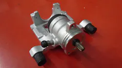 Figure 3: Brand new caliper with the actuator motor removed. The splined shaft visibly meshes with the actuator when installed. Figure 3: Brand new caliper with the actuator motor removed. The splined shaft visibly meshes with the actuator when installed.