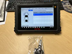 Figure 5 – Autel MaxiSYS MS906TS scanner and a TPMS sensor. Figure 5 – Autel MaxiSYS MS906TS scanner and a TPMS sensor.