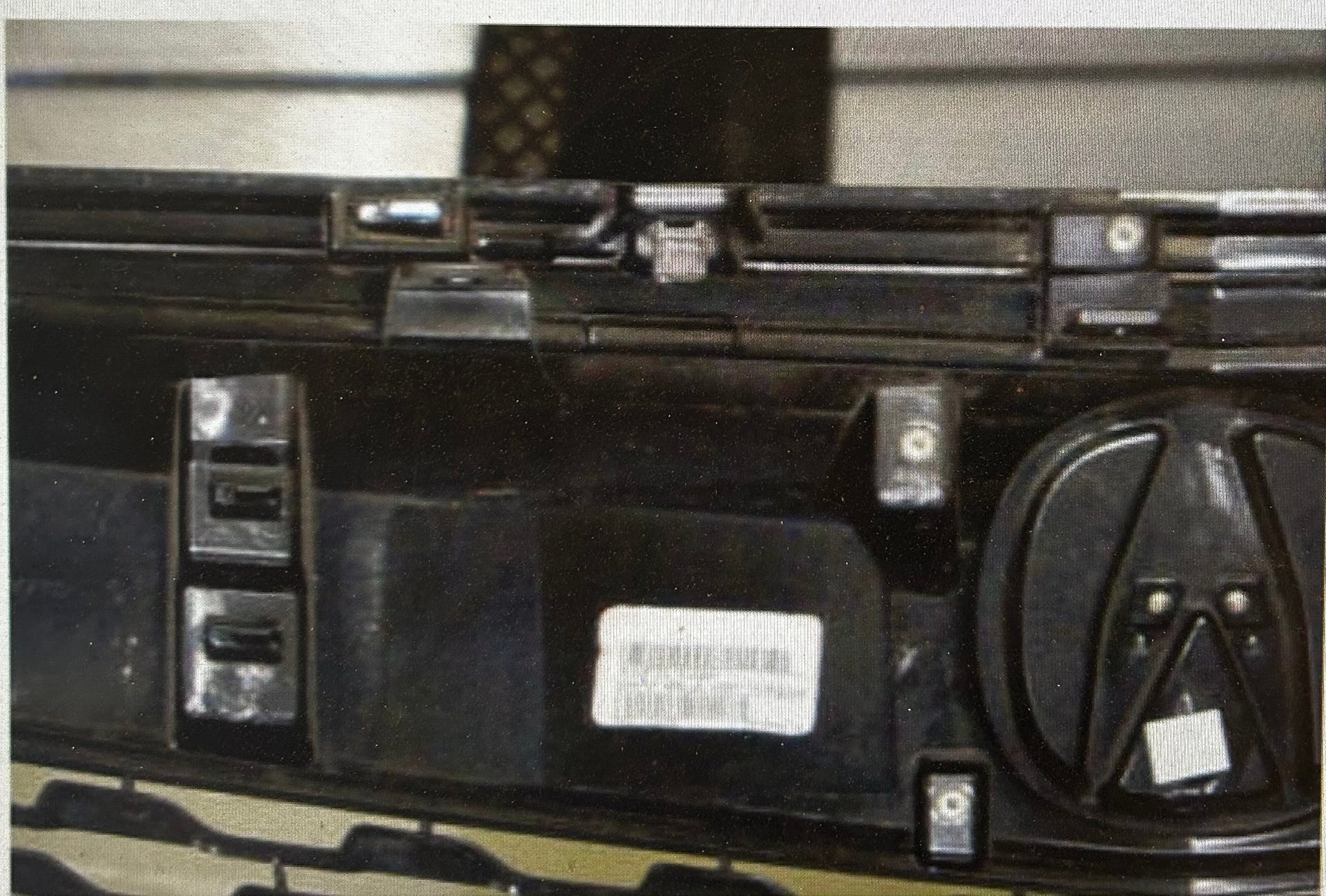 Example of a front grille upper molding rear with CMBS.