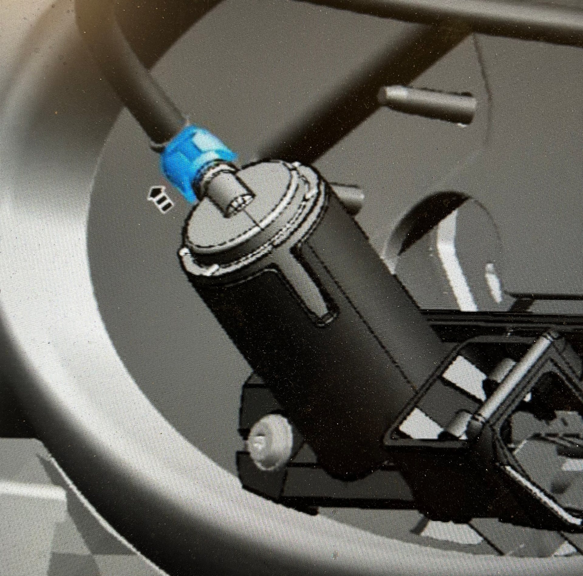 Remove the washer jet hose and pull the washer jet out of its housing.