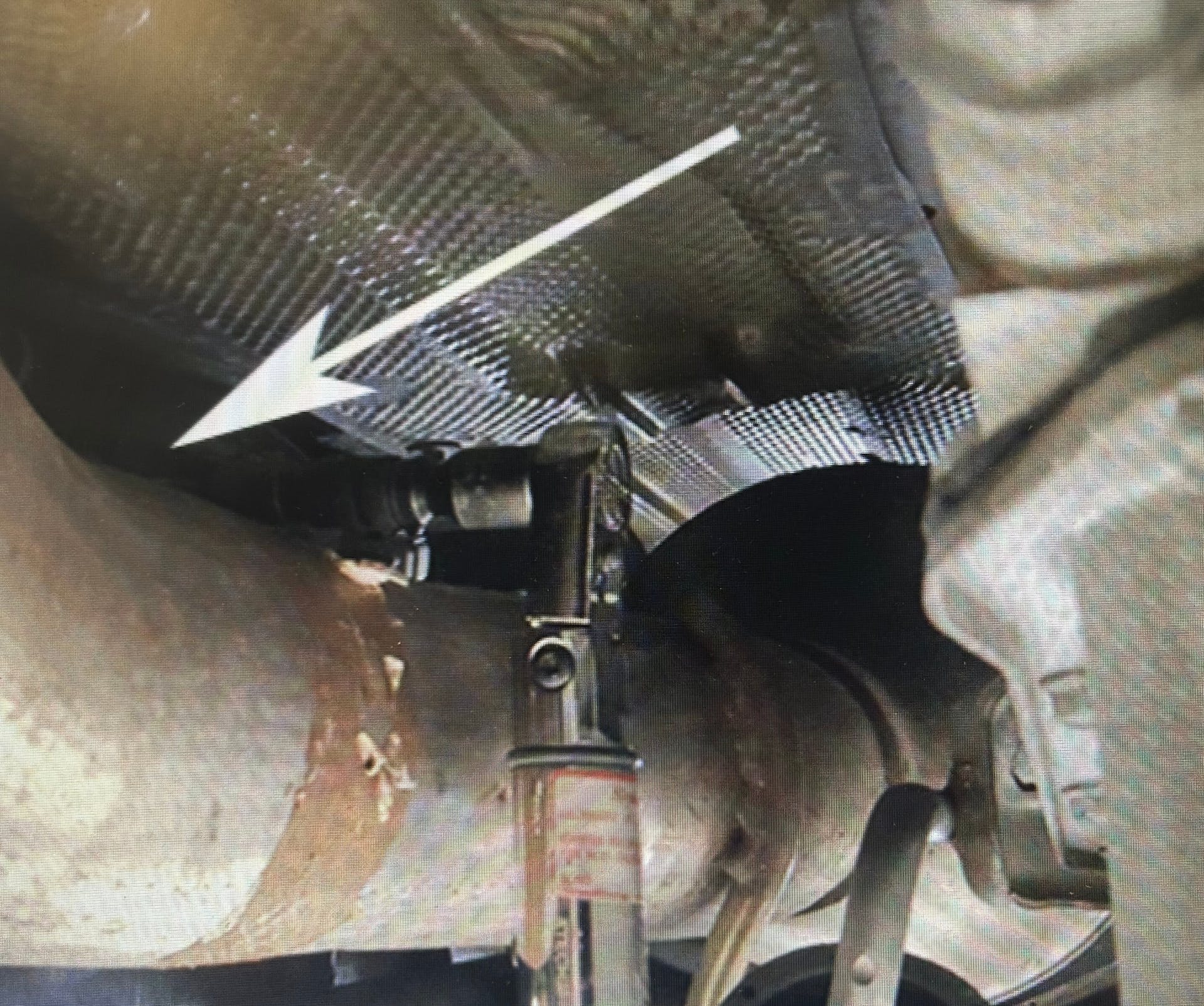 Example of access to the DEF tank fasteners.