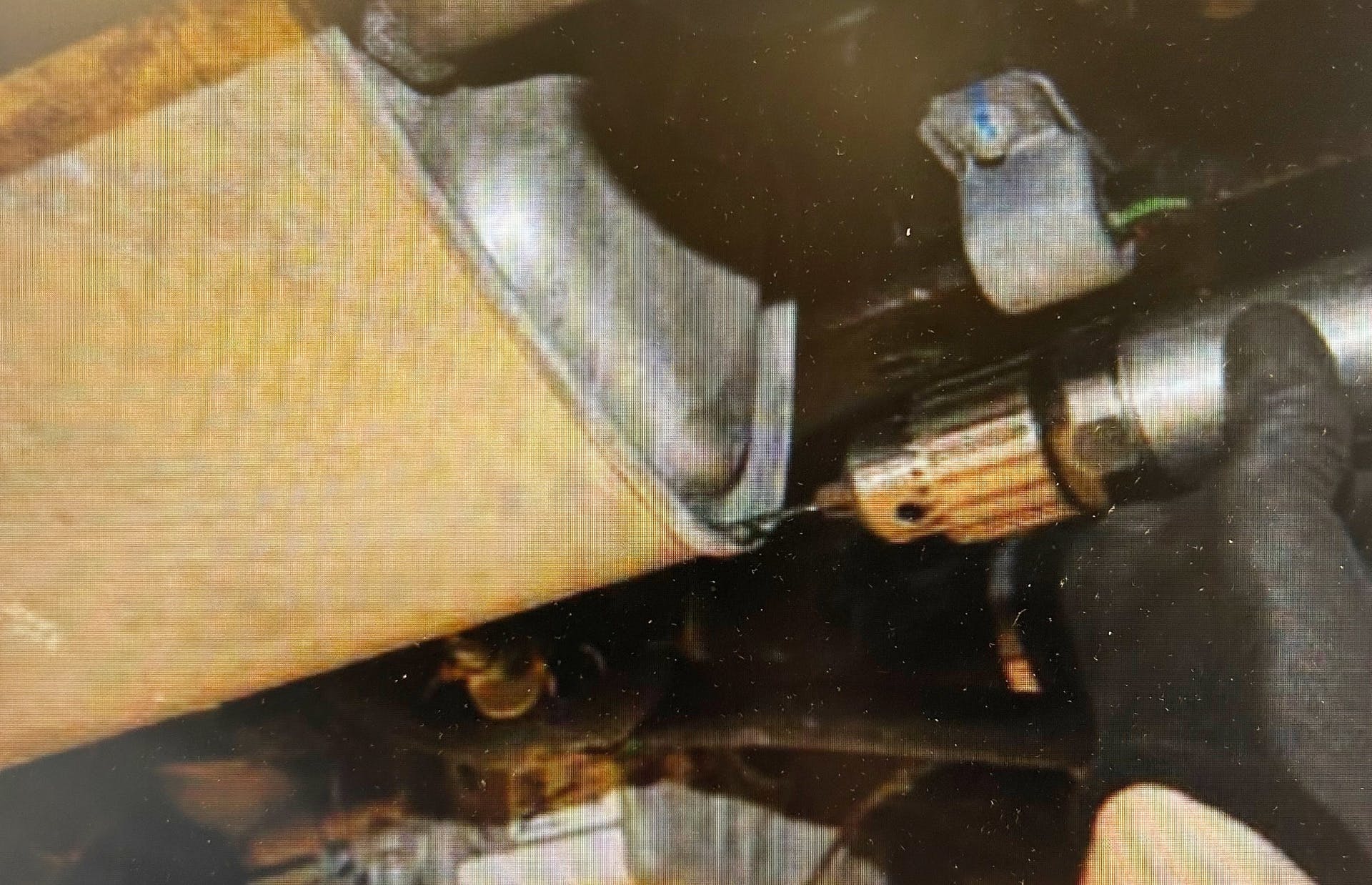 If no weep hole is already present, drill a 1/8-inch hole into the lower rear corner as shown. Do not drill deeper than one inch.