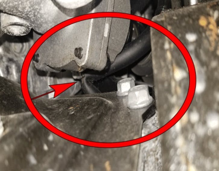 Inspect the front axle vent hose for misrouting and kinking.