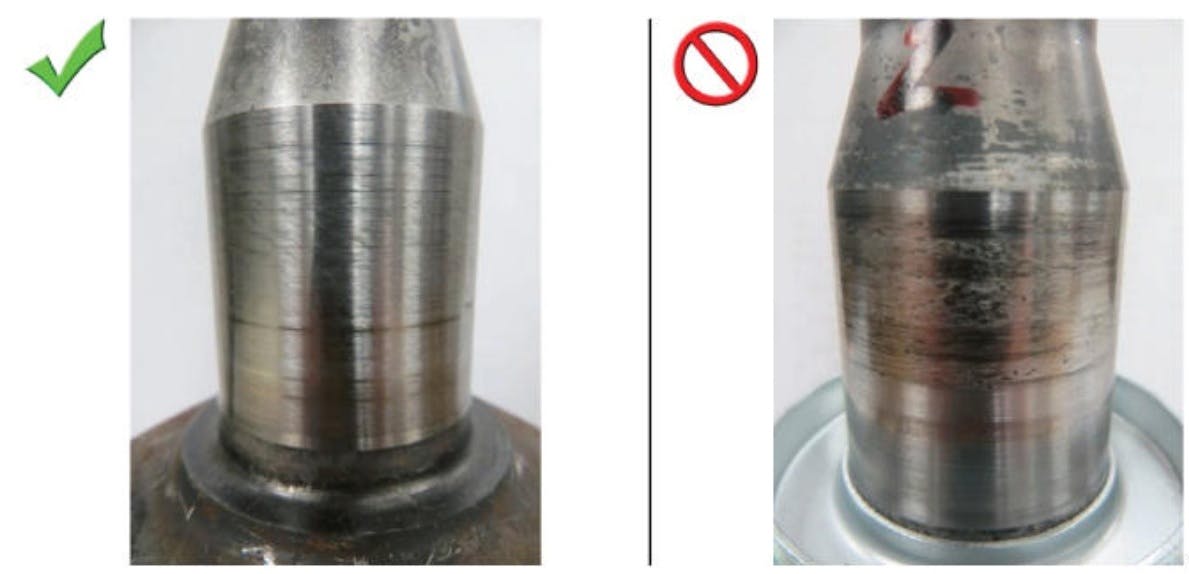 Example of good half shaft journal (left) and a journal that shows metal transfer from the bushing (right).