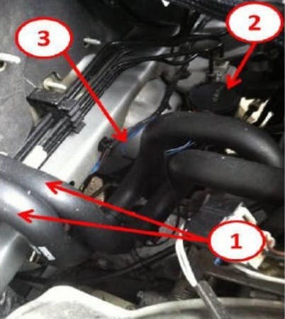 1) Heater core supply and return hoses; 2) Purge solenoid; 3) Purge solenoid wire harness.