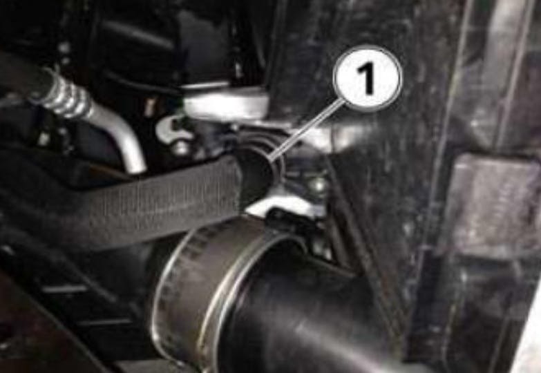 Example of the softer rubber outflow hose location.