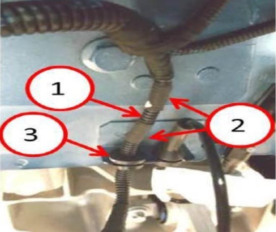 1) Correct position for grommet; 2) Wrapped tape; 3) Grommet.