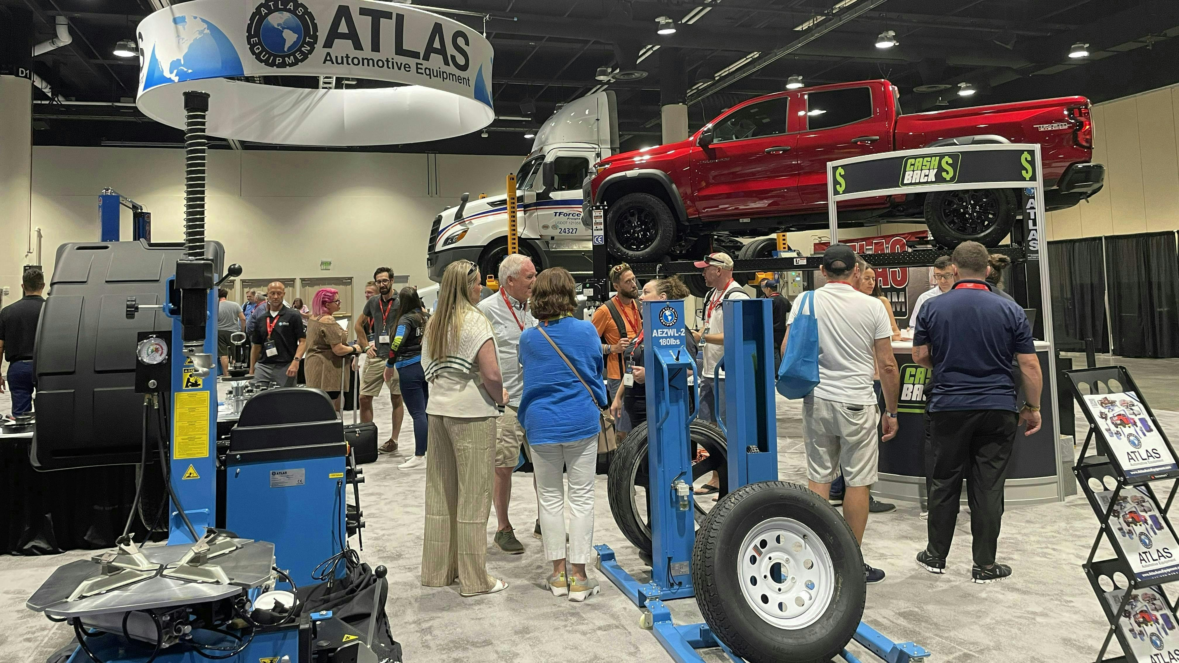 The Atlas Equipment booth featured several demonstrations of the company's lifting equipment.