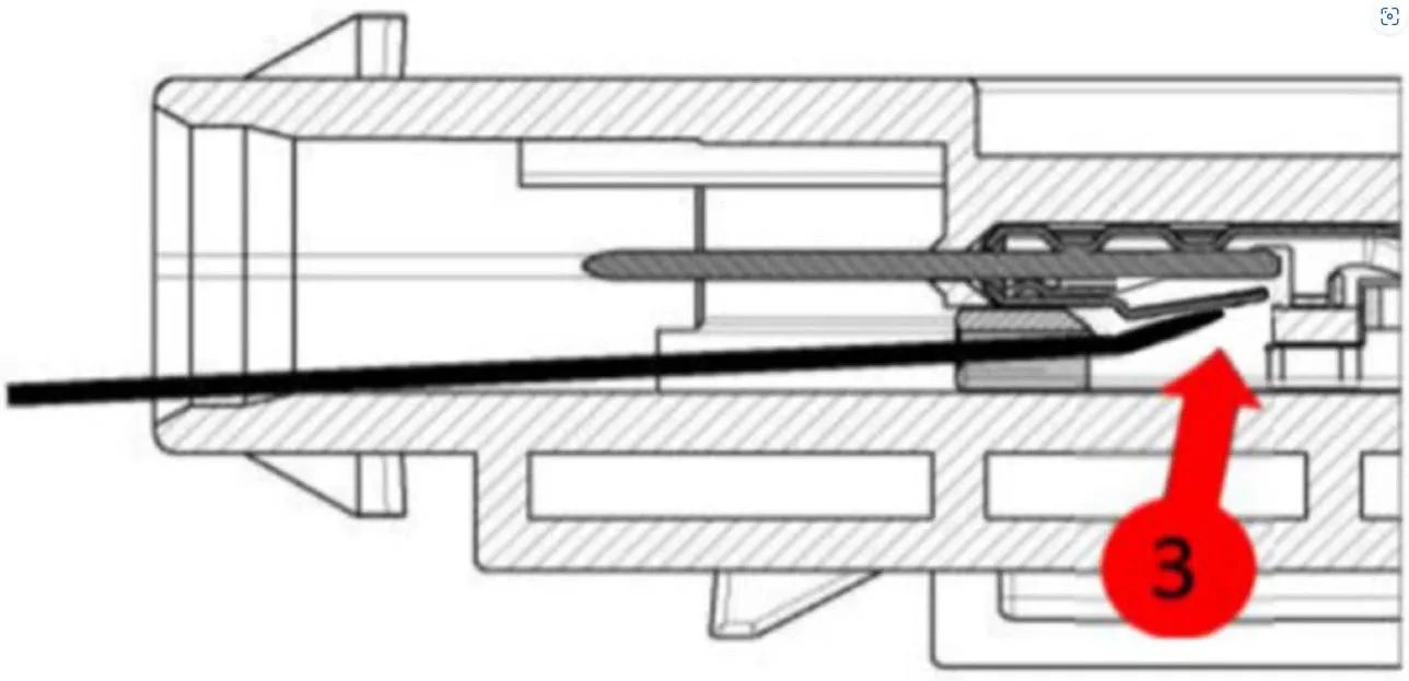 Once the release tab is pushed in, pull the wire and terminal out of the rear of the connector body.