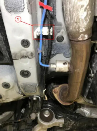 The fuel line at the white clip may be moved slightly.