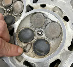 Example of a cylinder head that features direct injection, where high pressure fuel is injected directly into the combustion chamber. Example of a cylinder head that features direct injection, where high pressure fuel is injected directly into the combustion chamber.