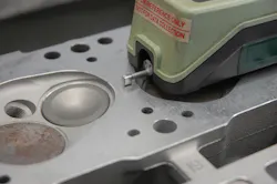 A motorized stylus slowly moves across the surface, providing an accurate RA reading. Surface finish is critical. Depending on the head (iron or aluminum), and the type of head gasket (composite or MLS/multi-layer steel), a specific range of RA finish is required. A motorized stylus slowly moves across the surface, providing an accurate RA reading. Surface finish is critical. Depending on the head (iron or aluminum), and the type of head gasket (composite or MLS/multi-layer steel), a specific range of RA finish is required.