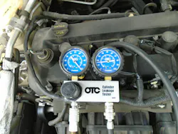 Figure 8 shows the leakdown tester hooked up to cylinder #2. Figure 8 shows the leakdown tester hooked up to cylinder #2.