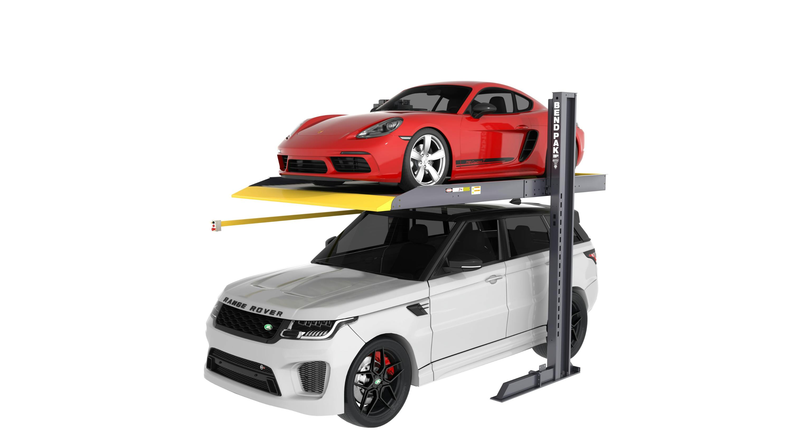 a black and yellow vehicle lifts holds a white SUV below a red sports car on a lift platform