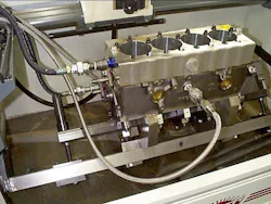 The hot honing unit is plumbed to the block on the honing machine. The theory is to attempt to simulate engine operating temperature (at least in terms of coolant temp) during honing. The hot honing unit is plumbed to the block on the honing machine. The theory is to attempt to simulate engine operating temperature (at least in terms of coolant temp) during honing.