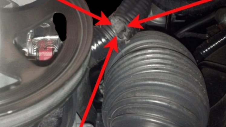 Inspect the wiring harness for rubbing at the vacuum pump pulley.