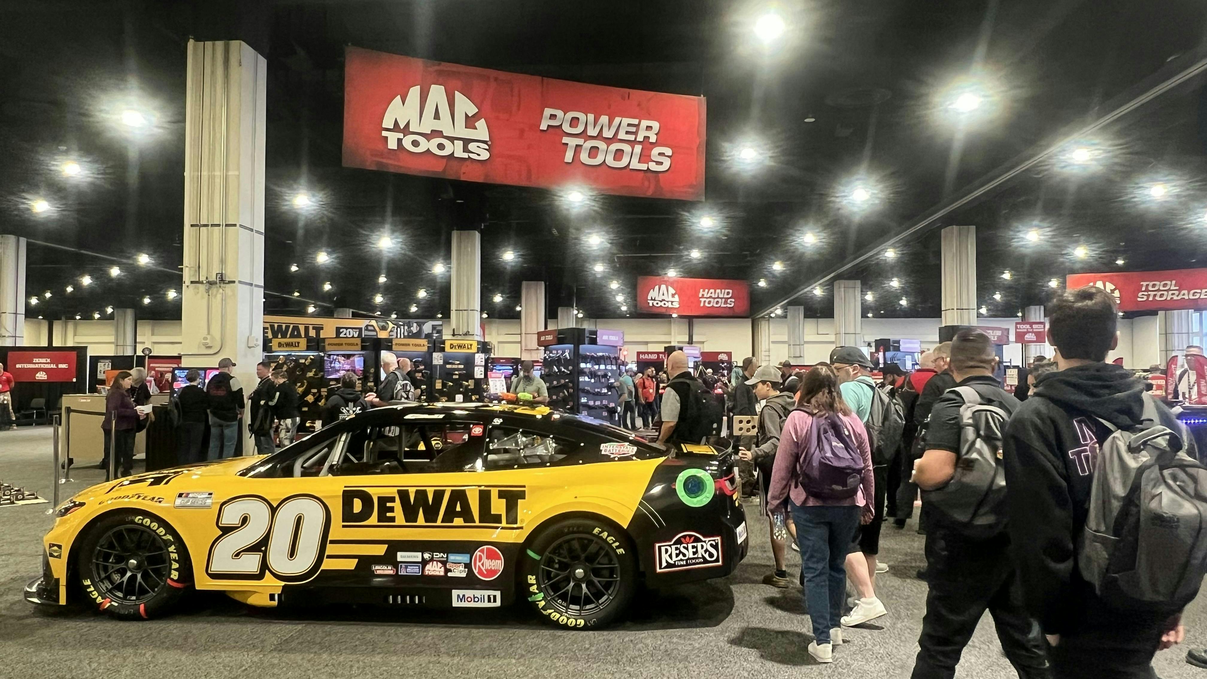 Attendees excitedly gather on the show floor after attending the Kick-Off Meeting.