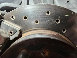 Stress cracking that formed due to excessive heat on a cross-drilled brake rotor off a third generation Chevrolet Camaro. Cross drilled rotors do a good job removing gas from the rotor surface but are not ideal for heavy prolonged usage where slotted rotors are better suited. Stress cracking that formed due to excessive heat on a cross-drilled brake rotor off a third generation Chevrolet Camaro. Cross drilled rotors do a good job removing gas from the rotor surface but are not ideal for heavy prolonged usage where slotted rotors are better suited.