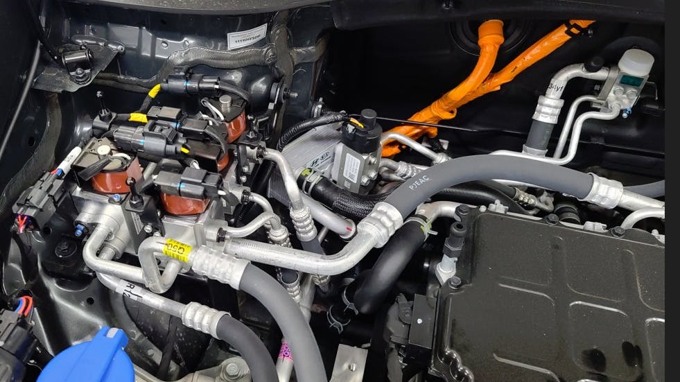 This photo shows the complex valving and controls of the refrigerant on a 2022 Hyundai IONIQ, that is equipped with a heat pump system.