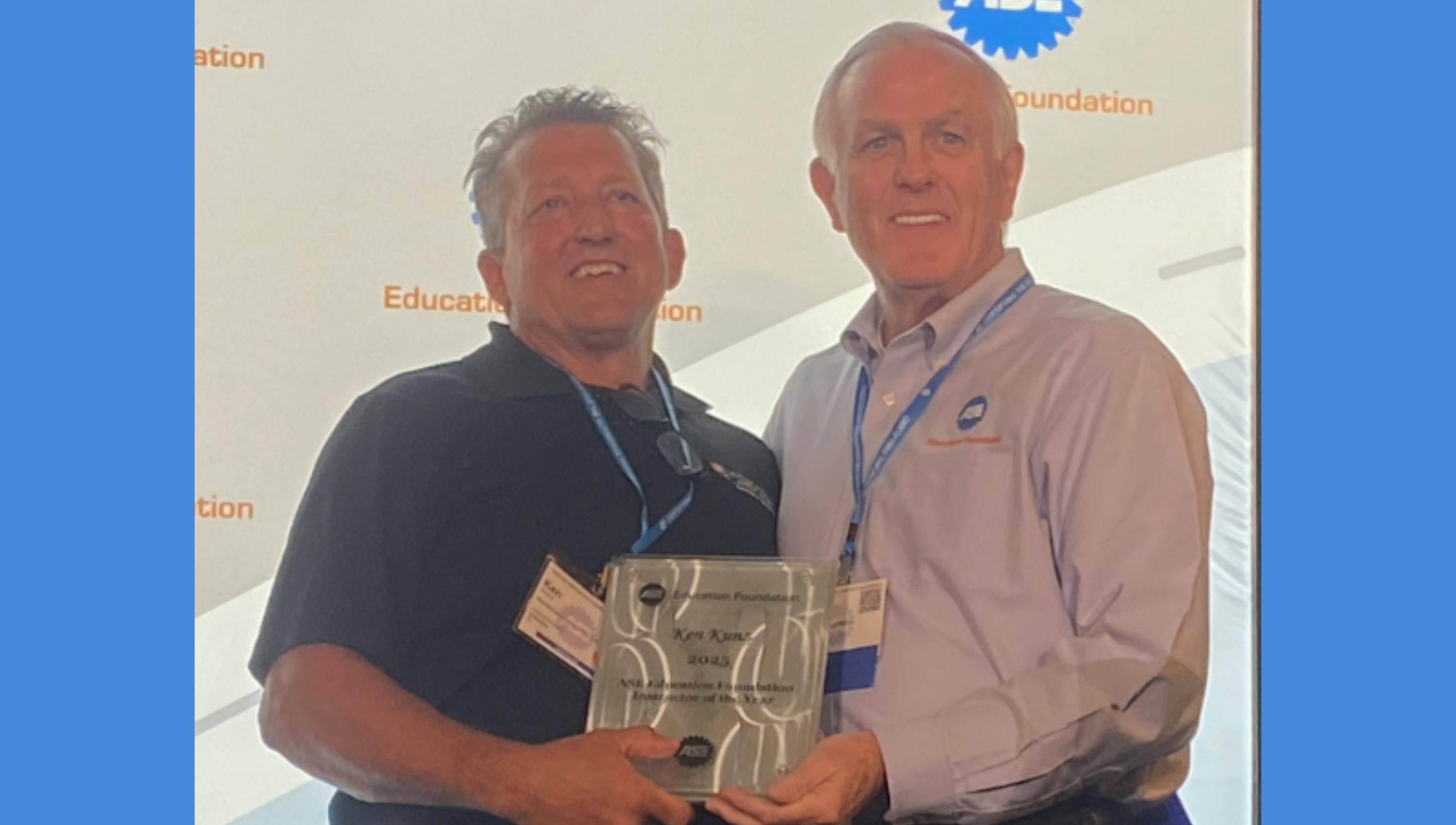 Kunz accepts his award