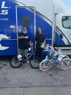 Every time he stopped, Neugebauer's customers would bring him new bikes to give away. Every time he stopped, Neugebauer's customers would bring him new bikes to give away.
