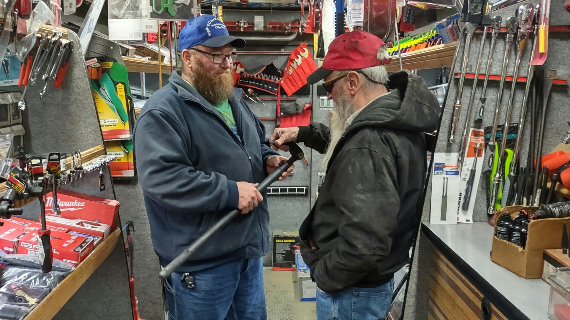 Ed Wright with customer on tool truck
