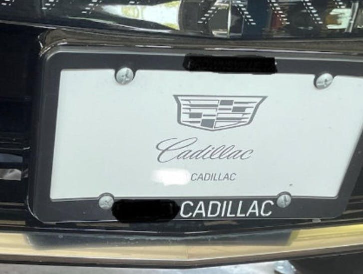 The front license plate frame may cause intermittent park assist warnings.