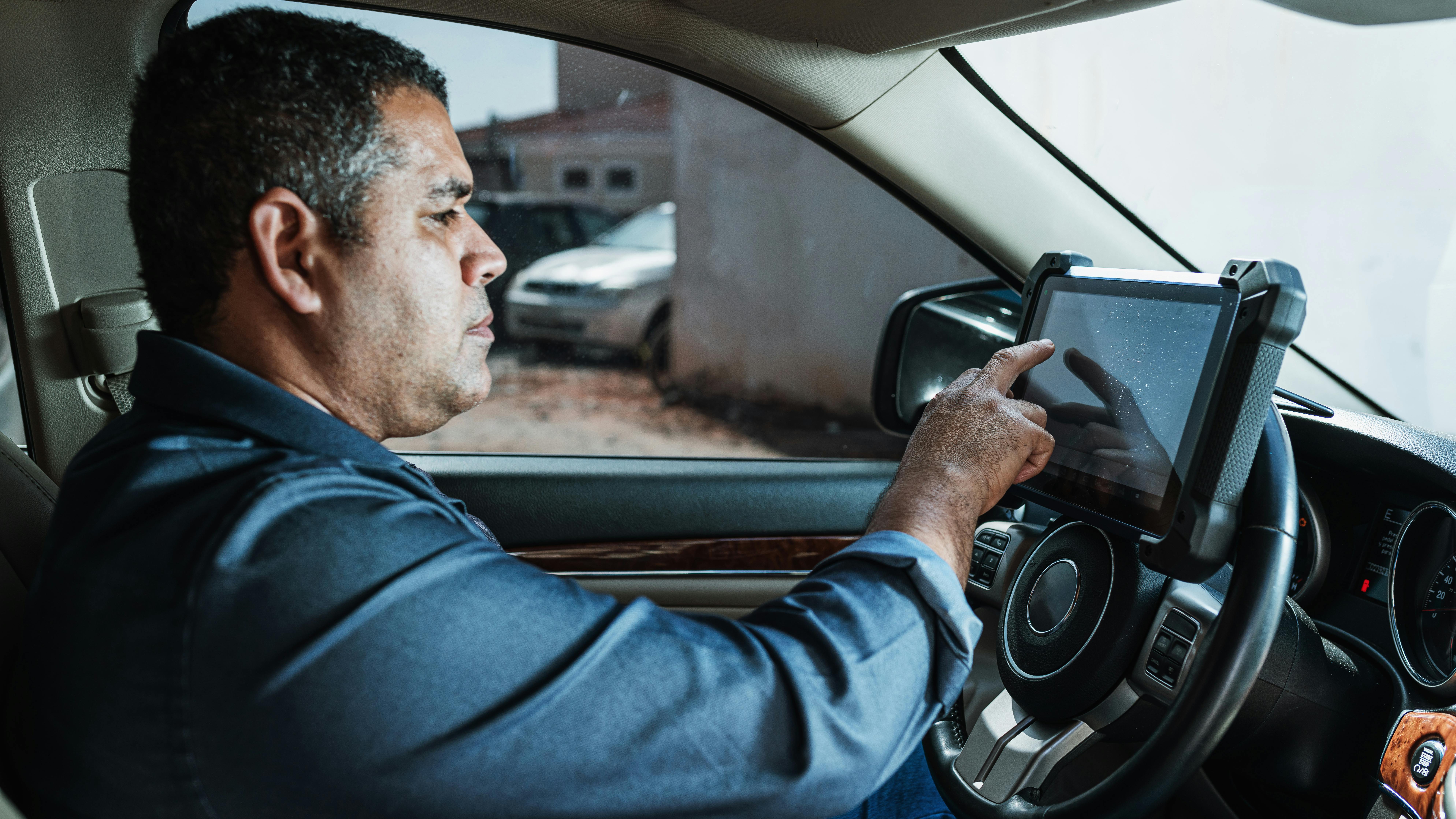 Automotive technician using a scan tool