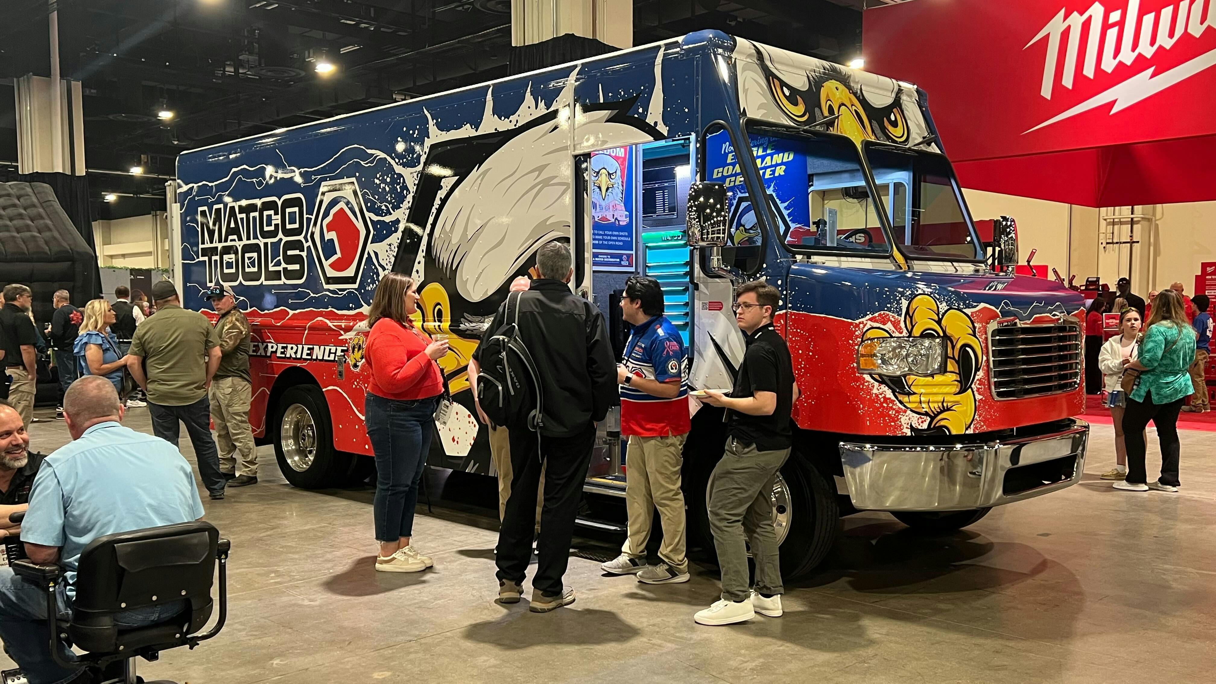 Attendees gathered around to check out the 'Eagle Experience' tool truck.