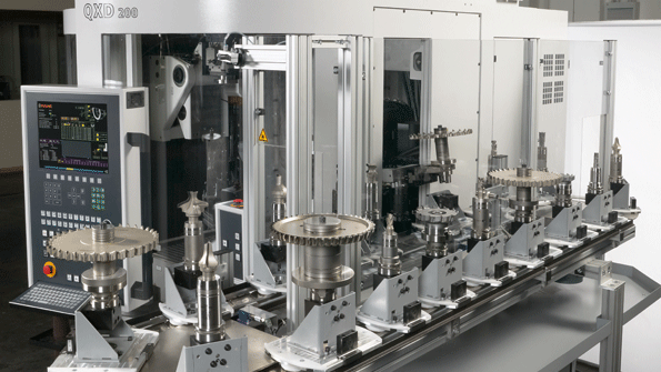 Vollmerrsquos QXD series machines have modular automation components that can be added to any model at any time and hold up to 64 individual PCD tools thanks to RFID tracked pallets A smaller pallet system ND260 holds up to 29 tools