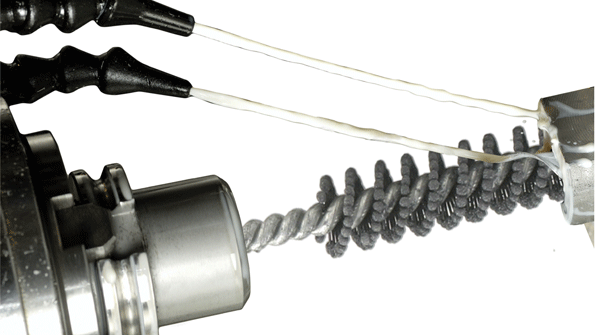 The FlexHone Tool can be mounted in a hand tool or machine tool chuck for finishing or resurfacing of hard metals ceramics and other tough materials used in items like ports sleeves and cylindrical bores