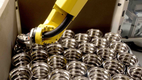 Once the finished bearing races have been automatically measured the hardturned components are engraved and then placed in shipping containers by the robot