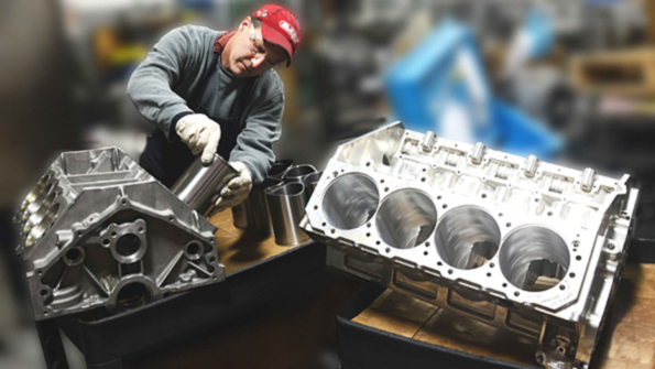 Dart Machinery technician Bob Dimitrijevich installs Darton iron sleeves in cast aluminum block as a billet aluminum racing block awaits installation Aluminum block bores are honed for size and geometry before liner installation