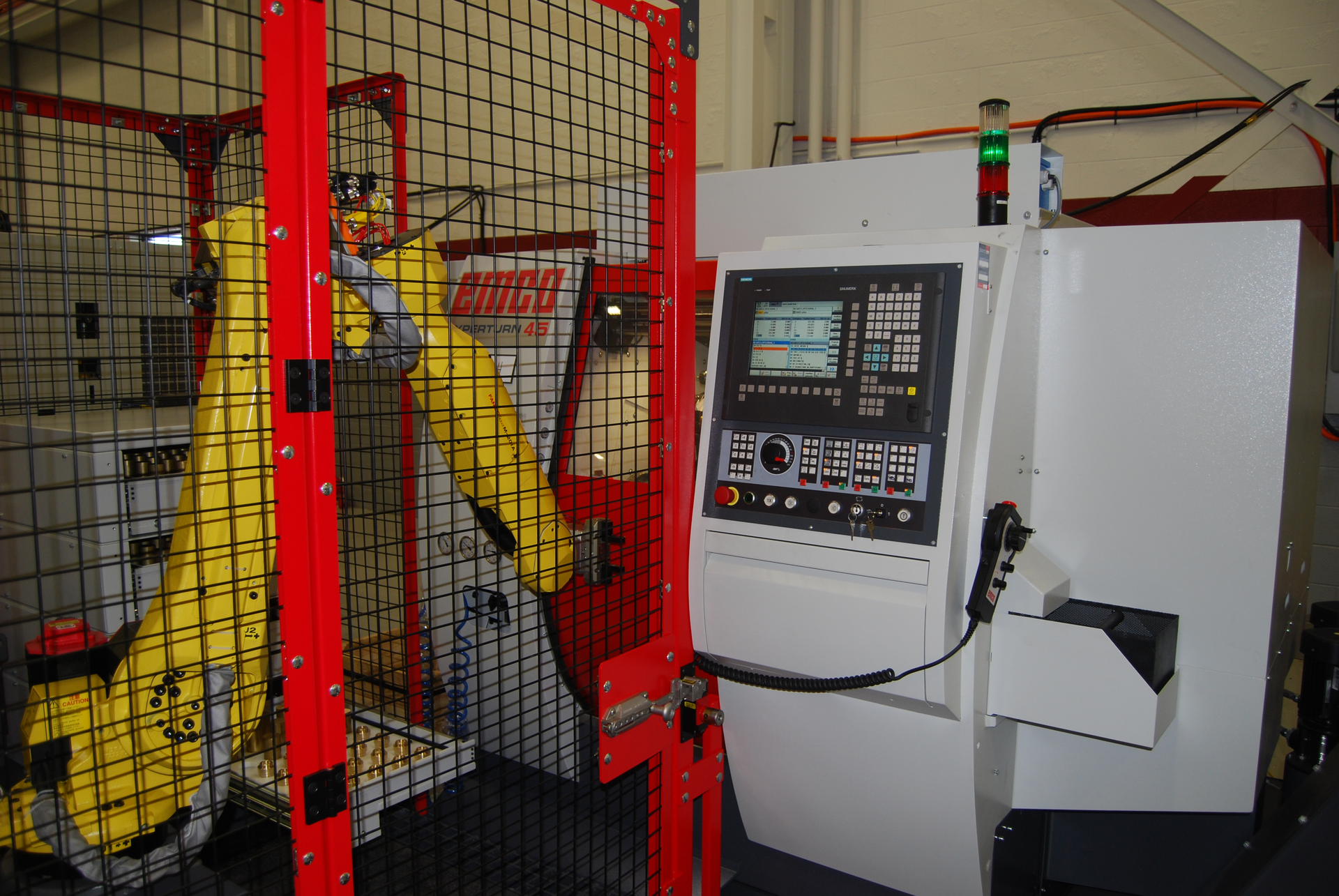 The challenge to the work cellrsquos developers was to design a flexible handling system around a compact turning machine and to make it scalable configurable to different machine models and proven reliable with millions of openclose cycles