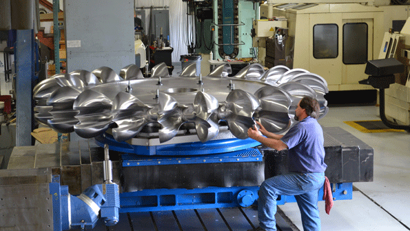 A hydropower ldquorunnerrdquo in process at Canyon Hydrorsquos automated CNC facility in Sumas Wash mdash a shop that runs 24 hoursday every day Completing one runner is a five axis job that takes months and produces one and a half ton of chips The bulk of machining is handled with standard 2inch indexable ball mills but critical undercuts are completed with a modified standard Ingersoll button mill that makes chips on the way in and also on the way out