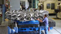 A hydropower ldquorunnerrdquo in process at Canyon Hydrorsquos automated CNC facility in Sumas Wash mdash a shop that runs 24 hoursday every day Completing one runner is a five axis job that takes months and produces one and a half ton of chips The bulk of machining is handled with standard 2inch indexable ball mills but critical undercuts are completed with a modified standard Ingersoll button mill that makes chips on the way in and also on the way out A hydropower ldquorunnerrdquo in process at Canyon Hydrorsquos automated CNC facility in Sumas Wash mdash a shop that runs 24 hoursday every day Completing one runner is a five axis job that takes months and produces one and a half ton of chips The bulk of machining is handled with standard 2inch indexable ball mills but critical undercuts are completed with a modified standard Ingersoll button mill that makes chips on the way in and also on the way out