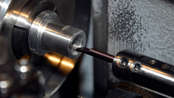 Medfab Manufacturing improved its boring of small diameter medical parts dramatically with new Ingersoll TMicro microboring tool The operation shown here is a threequarterinch hole in tantalum Even on bores down to 0243 inches in thinwall titanium tubing the tool produces asmachined surfaces of 810micro lasts up to 10 times longer than previous tooling at 16 faster machining rates